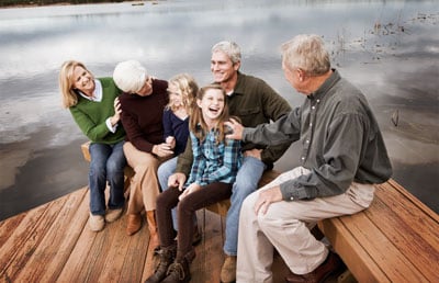 Generation Family Sitting on Dock