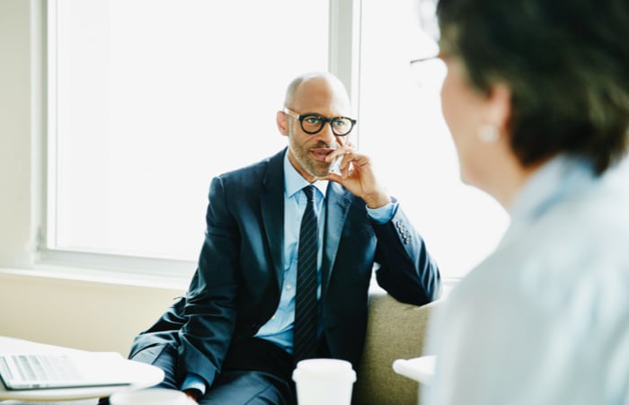 Tax auditor speaking to client