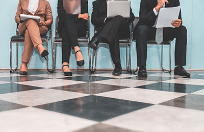<img src=”taxcredits.jpg” alt=professionals sitting in chairs”>