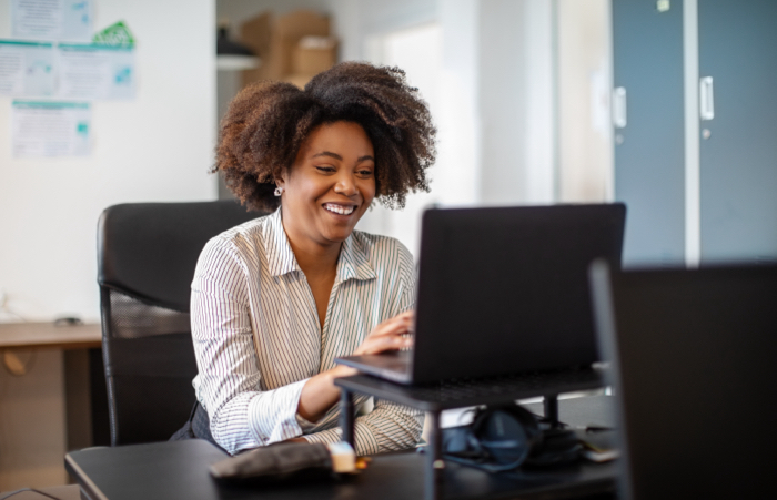 Business woman making a video call in office