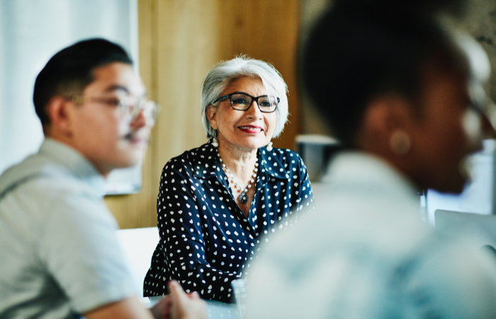 Educator smiling at students
