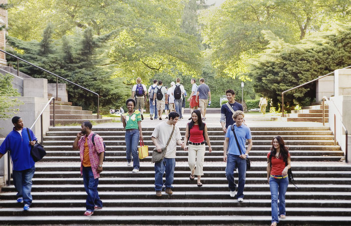 college students walking down stairs