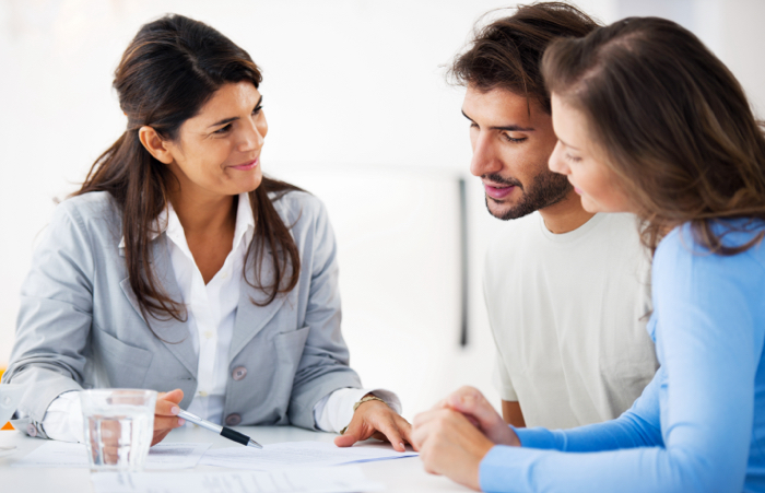 Tax advisor speaking to couple