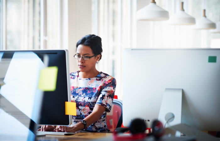 woman looking at computer