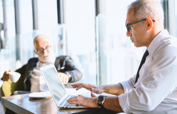 Mature man using laptop
