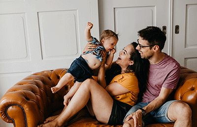 Couple with son on couch
