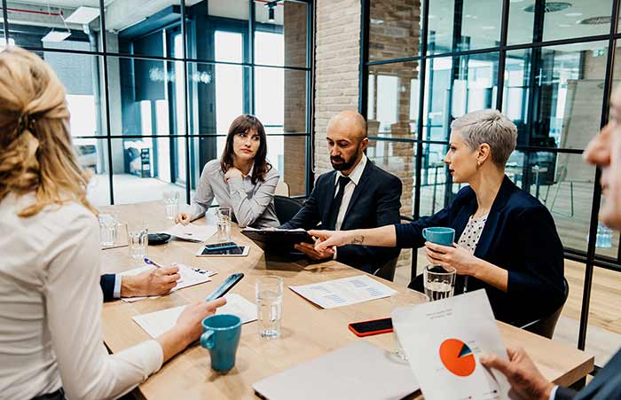 Boardroom Reviewing Financials