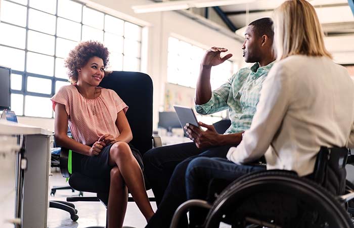 Businessman Having Discussion With Colleagues