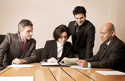 BusinessTeamatConferenceTable