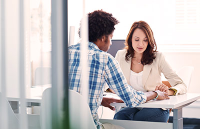 Conference Room Reviewing Documents