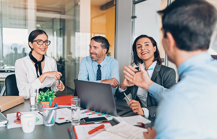 Group Of Business People In Meeting
