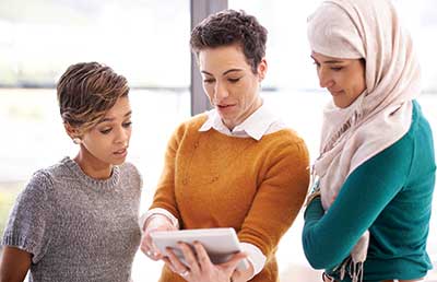 Group of Businesswomen with Tablet