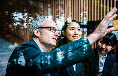 Man Glasses Guiding Clients