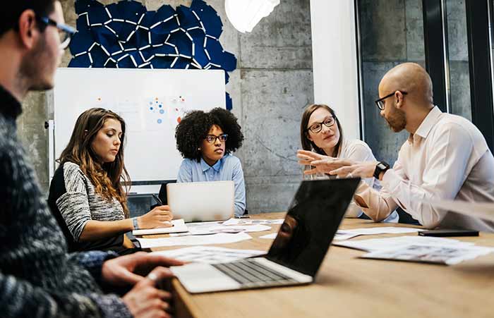Man Hand Gestures at Meeting