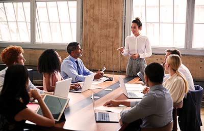 Team At Board Meeting