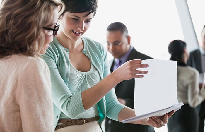 Two Women Reviewing the Plan