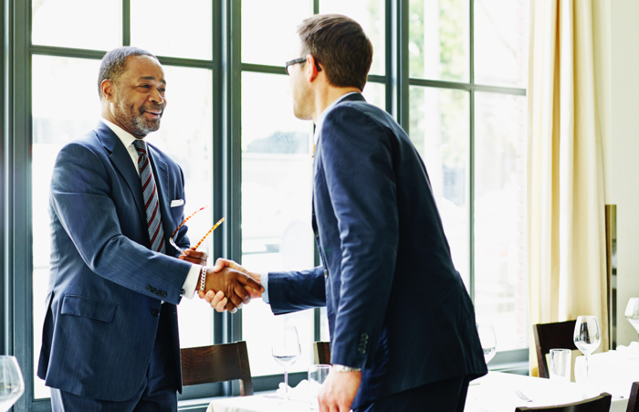 Two businessmen shaking hands