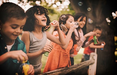 Kids Blowing Bubbles