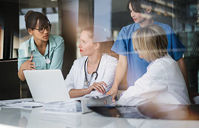Female Doctors Discussing Work