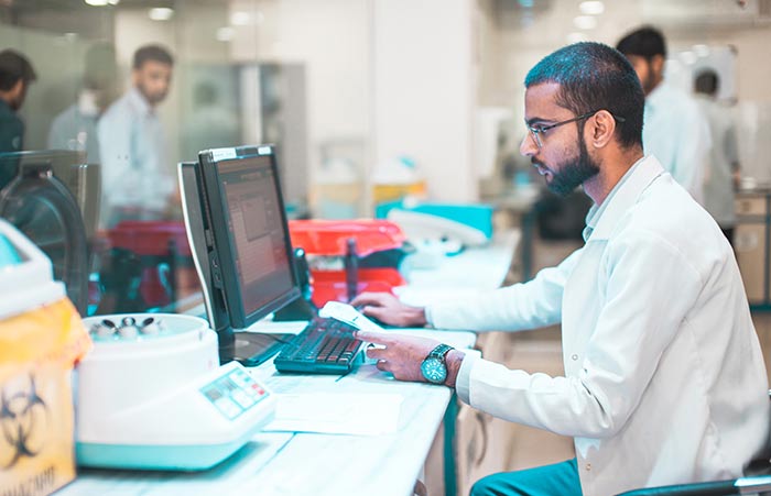 Pharmaceutical Guy On Computer