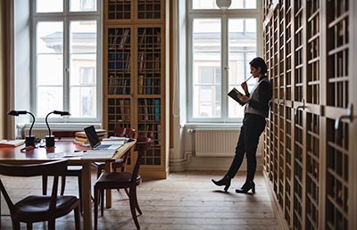 Woman Thinking Library
