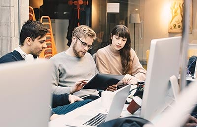 Computer Programmers Working Together