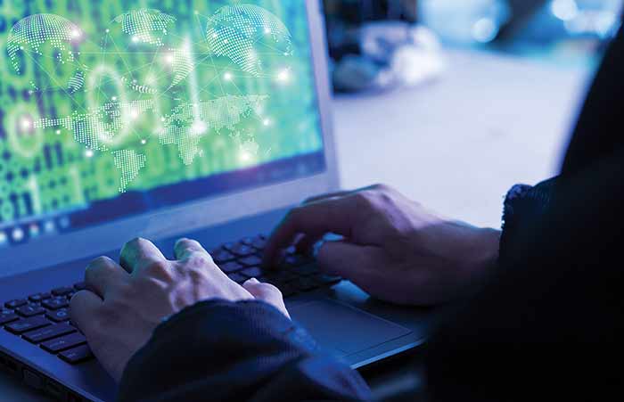 Hacker Breaking into System