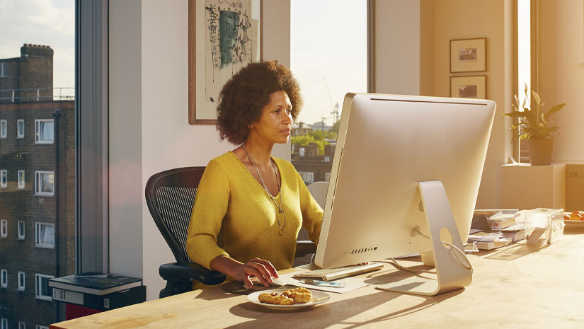 African american woman working in home office