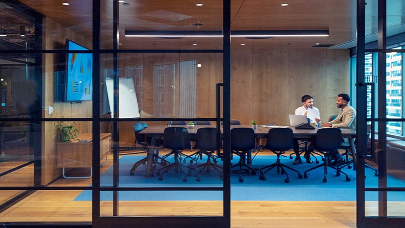 Business people working in a board room