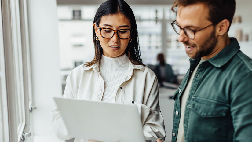 Business professionals standing in an office