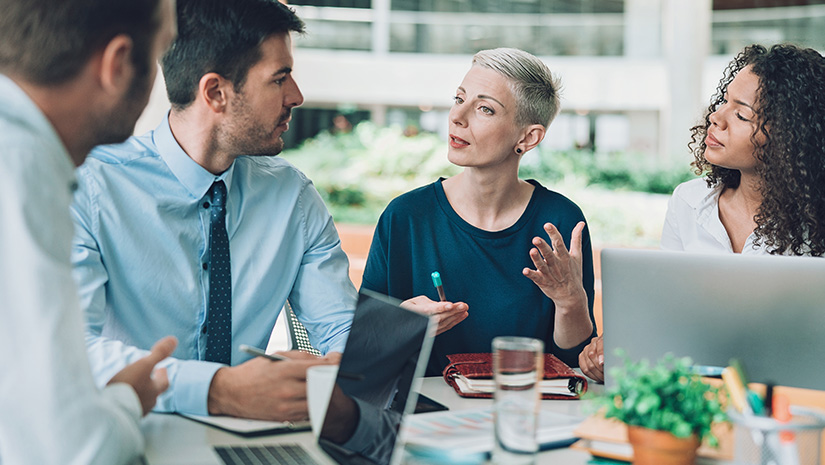 company executives in discussion