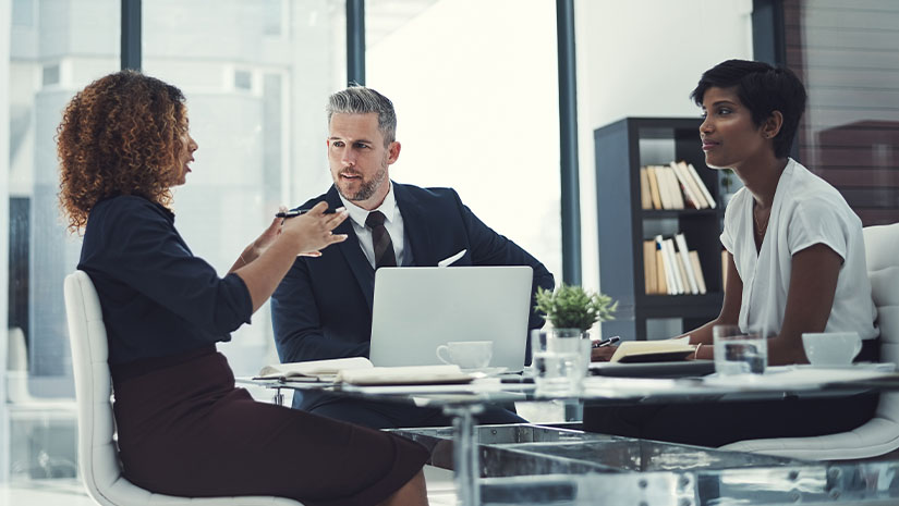 Shot of a group of businesspeople having a meeting in the boardroom