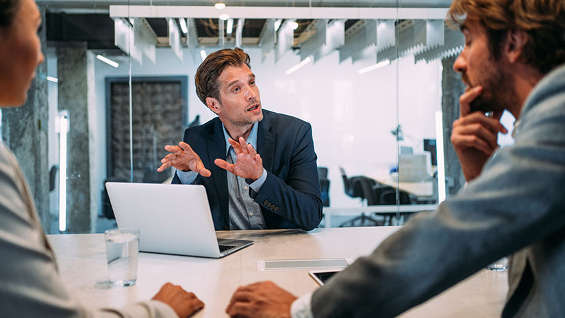 Group of business people talking in the office