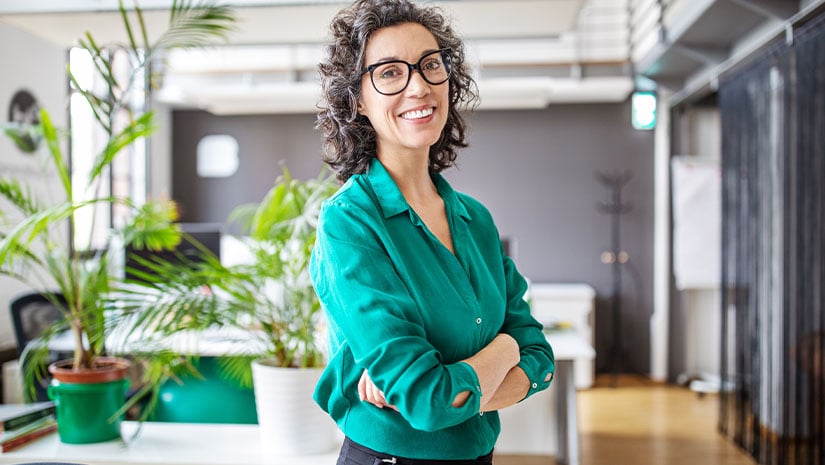 Portrait of confident mature businesswoman in office