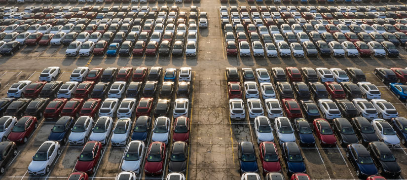 Rows of cars at car dealership