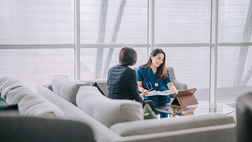 Female doctor explaining medical report