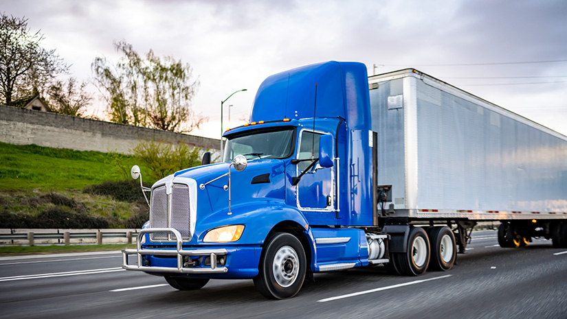Powerful Blue day cab big rig semi truck
