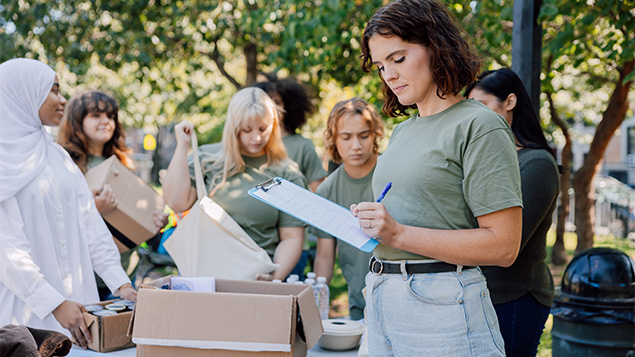 Community services young team of people helping the local community
