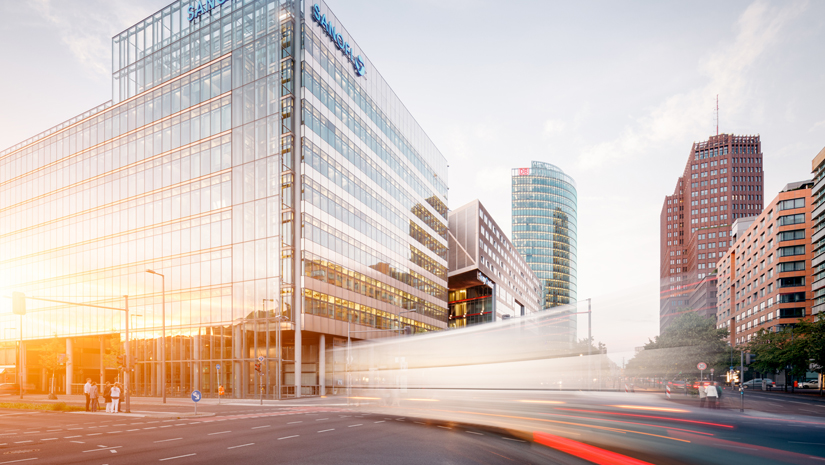 Busy city view with cars zooming by.
