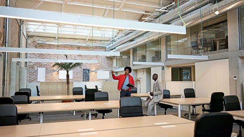 Commercial Real Estate Brokers Discussing Property Details