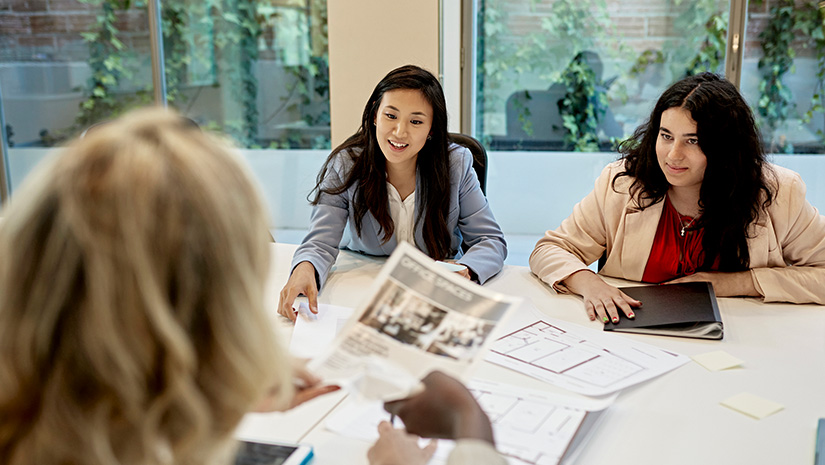 Commercial Real Estate Marketing Team Discussing Property