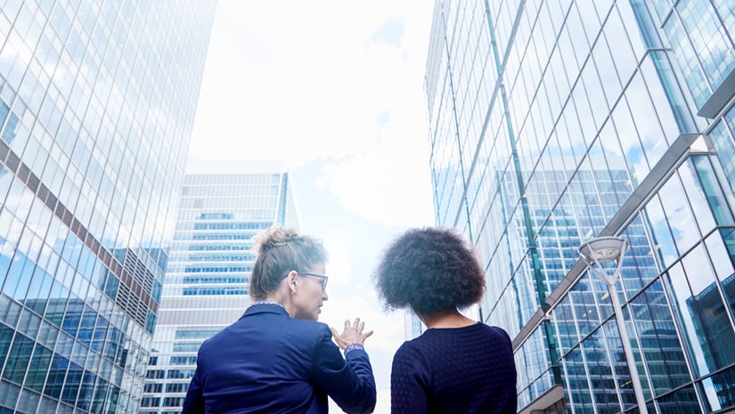 Real Estate Women Looking at Buildings