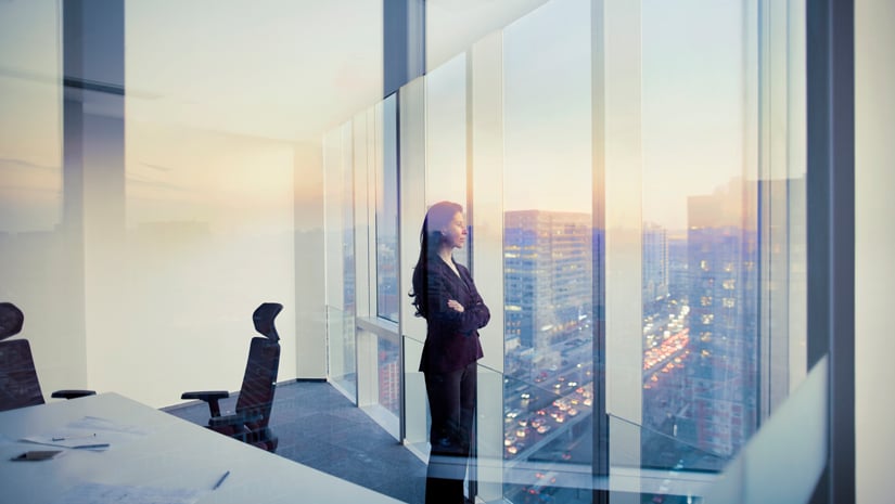 Executive businesswoman business person in conference meeting room in contemporary modern office