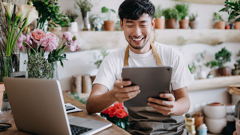 Male florist owner of small business flower shop