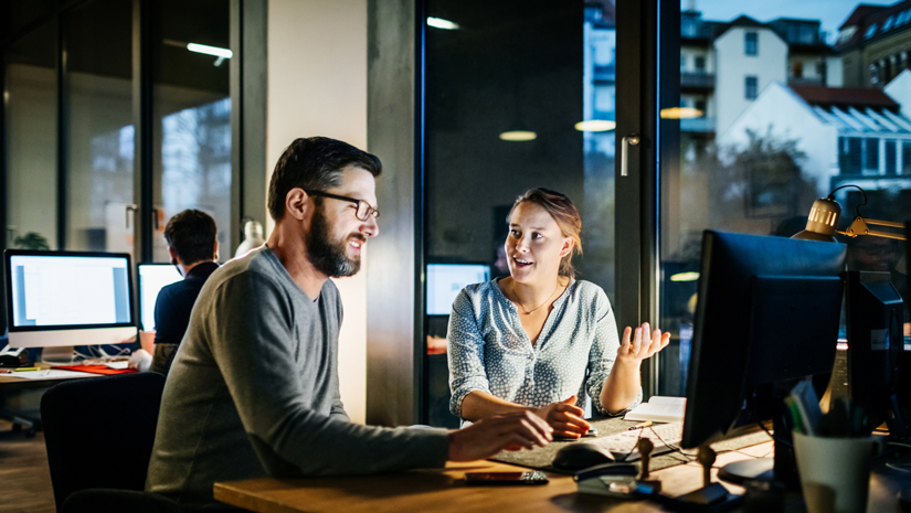 Coders working late in office