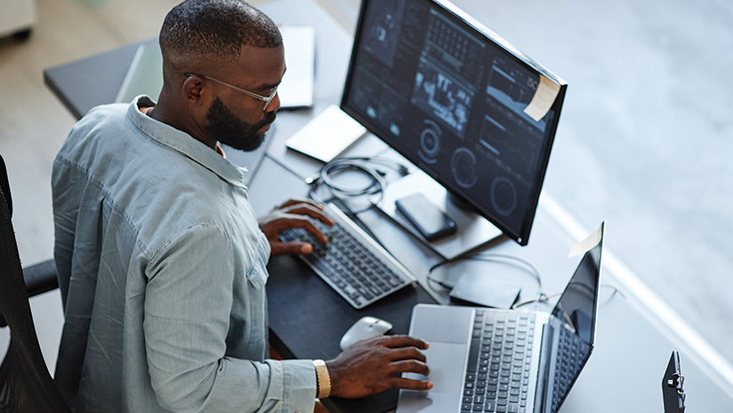 Software Developer Working with Computers and Data