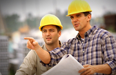 Two Construction Workers reviewing