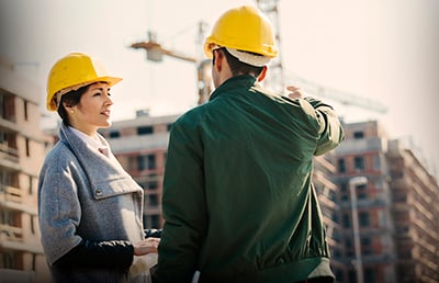 Advisor Construction Foreman Discussing Project