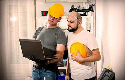 Two Men Remodel Laptop