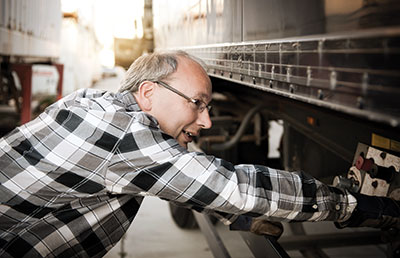 Man Working on Semi Truck
